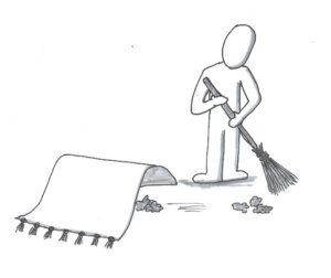 Männchen kehrt etwas unter den Teppich